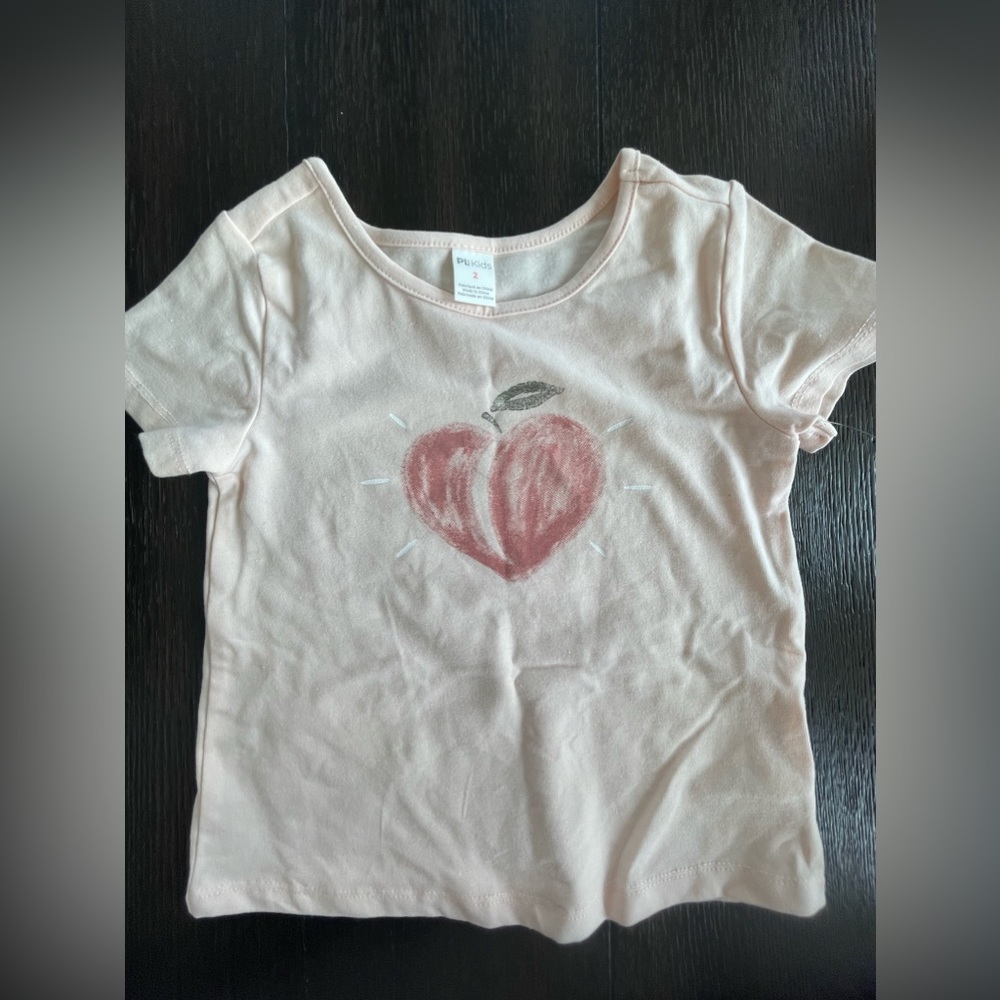 2T shirt. Never worn. Tags still on. Peach